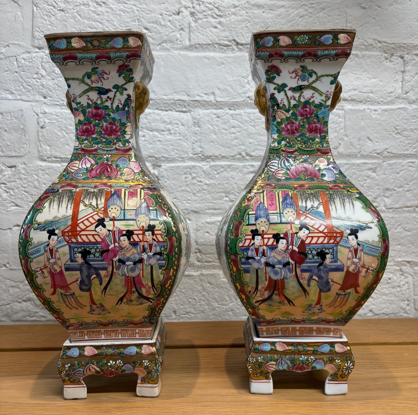 Pair of Late 20th‑Century Chinese Famille Rose Vases on Porcelain Stands